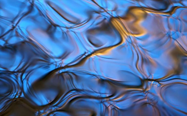 Woda - krople - reflected-golden-ripples.jpg